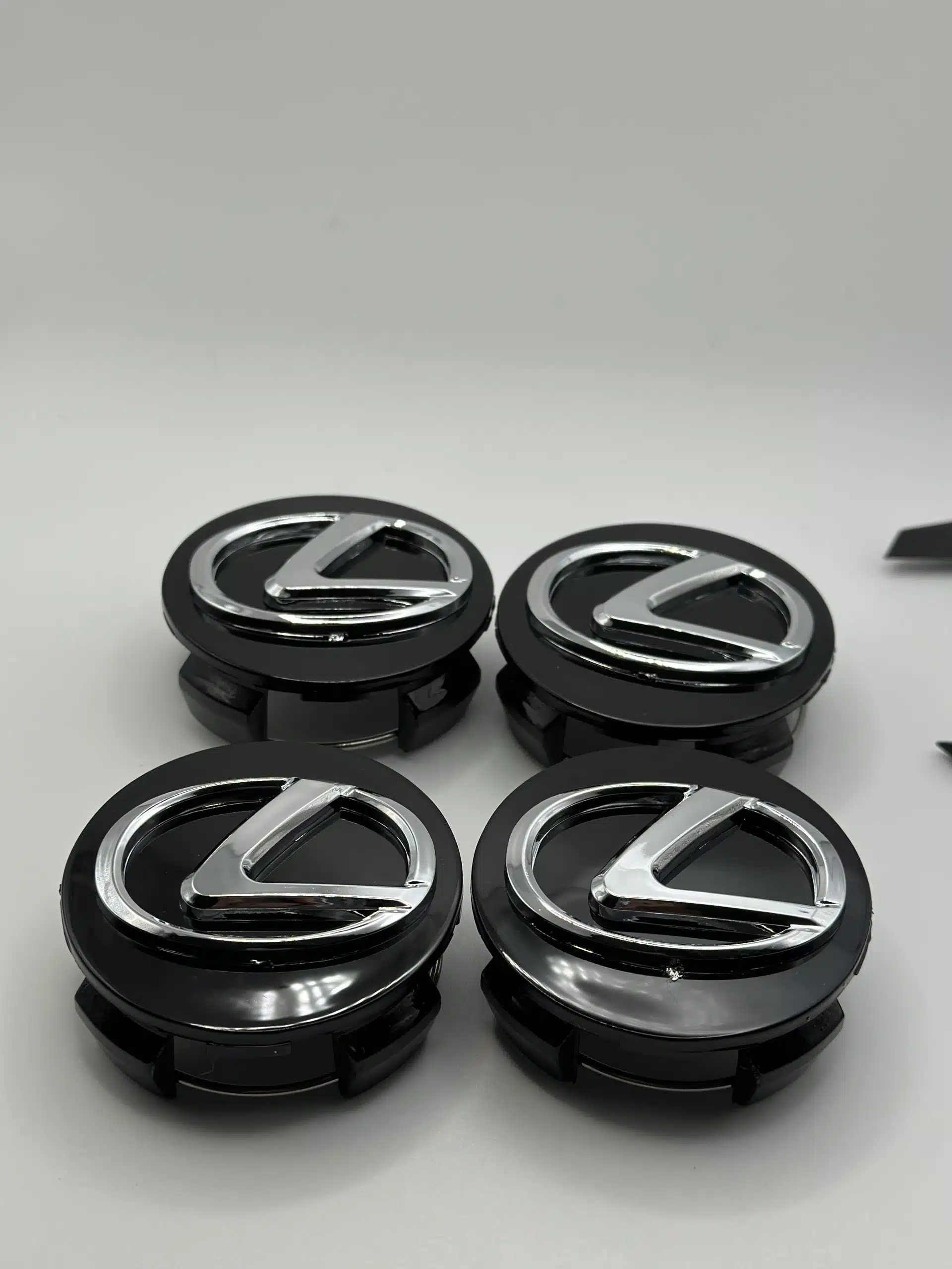 Lexus 62mm Black Wheel Center Caps Lexus 62mm Black Wheel Center Caps