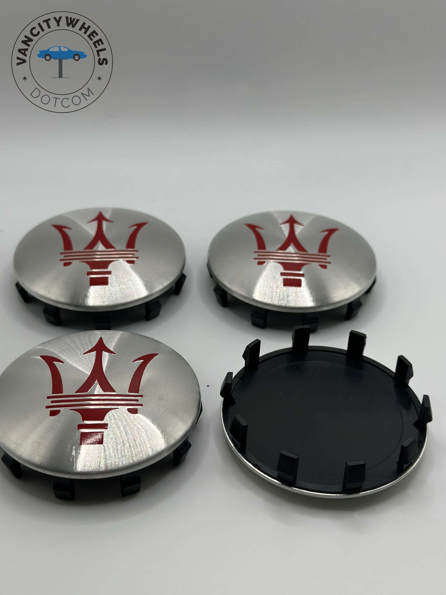 Maserati 60mm Silver Wheel Center Caps Maserati 60mm Silver Wheel Center Caps